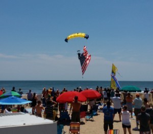 Navy Seal with American flag near beach