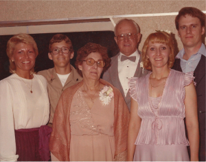 Genette at wedding reception with Joyce, Jay, Mom, Dad and Me