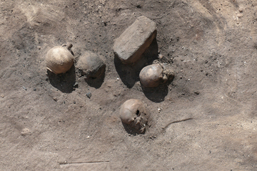 a bonfire where many of the victims of an ancient epidemic were incinerated