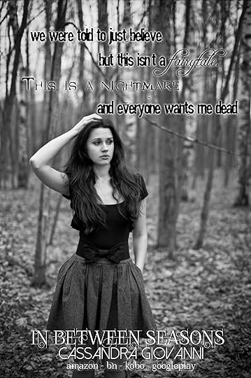Young woman standing in dark forest