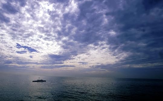 Pedal boat Moksha powered by adventurer Jason Lewis heading out in the Atlantic wilderness on the Expedition 360 human-powered circumnavigation
