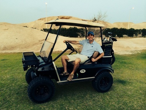 Horovitz chilling on a classic tricked-out Udhailiyah golf cart. Photo by Josh Olson