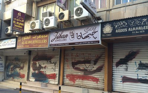 Marked-out graffiti in the souq neighborhood, a reminder of the continuing unrest.