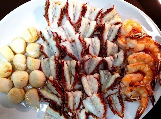 Scallops, rock shrimp, and pink shrimp. The rock shrimp tastes like lobster, only juicer.