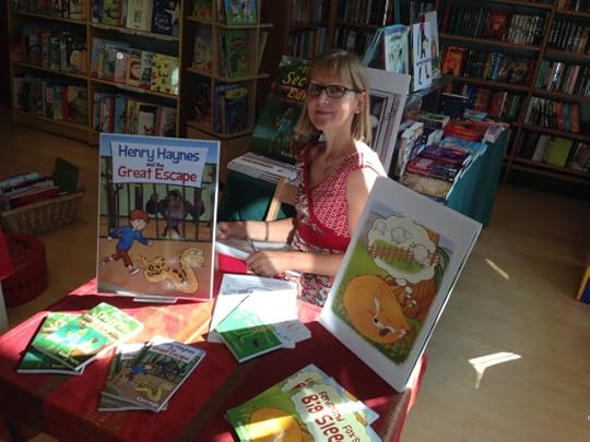 Image of children's author Karen Inglis sitting at signing table at Wimbledon Bookshop