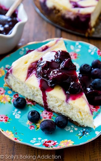 Ultra creamy homemade cheesecake swirled with a sweet blueberry swirl. All on top of my favorite buttery graham cracker crust! sallysbakingaddiction.com