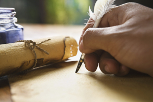 Hand writing using quill pen