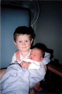 Kids Adam holding Paul