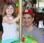 'lil q decided the best part of the zoo was the Merry-go-round.