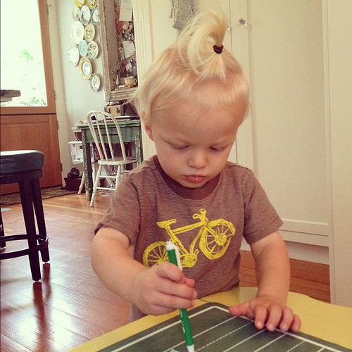 True tried out a pony tail today. Lasted about two minutes. Cuteness.