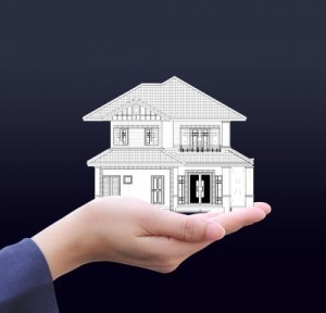 House In Business Hand by Naypong