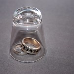 Shot glass and wedding rings