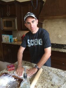 Chef Rob works the dough.