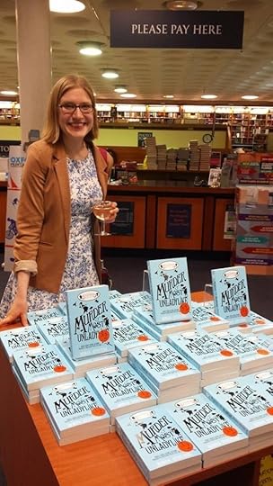 With a table of books at my Oxford launch - photo by Rebecca Waiting.