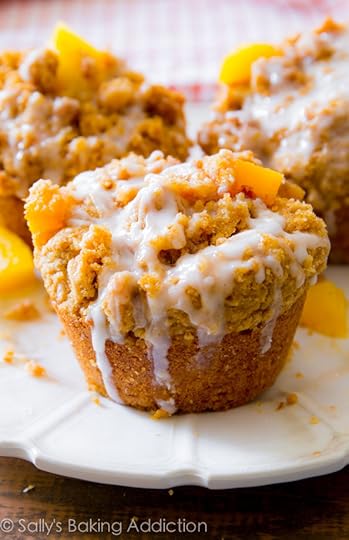 This is my favorite peach muffin recipe! Buttery and moist, these peachy muffins are heavy on the crumb topping and vanilla glaze.