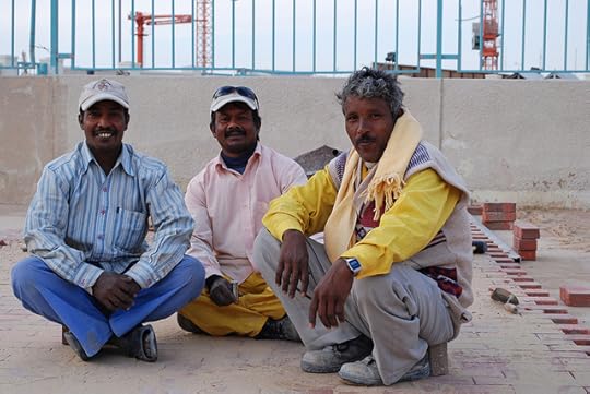 Builders at Work: There are close to one million migrant workers in Qatar, mainly from South Asia. The majority work in construction. Photo by WBUR Boston's NPR News Station. CC BY-NC-ND 2.0 via wbur Flickr.