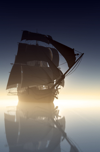 Old sailing ship on a misty sea