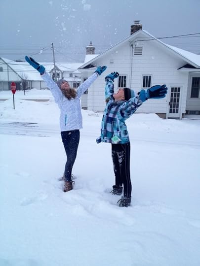 Daughters in the snow. Not much in Seattle, so they were very impressed! 