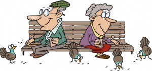 couple feeding birds