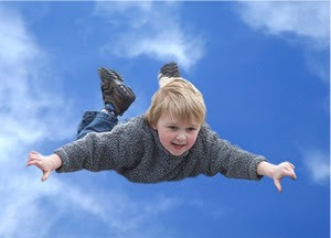flying-boy-clouds