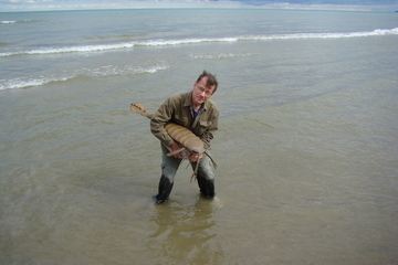 man with sea scorpion