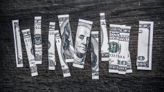 Money cut into pieces - Photo by Flickr user Tax Credits