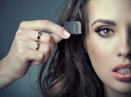 woman inserting card into her head