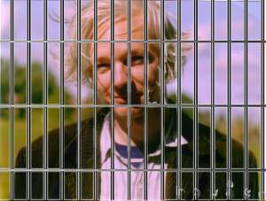 Julian Assange behind bars