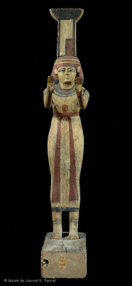 A statuette of Nephthys with Her name glyph, showing the neb basket and the temple 