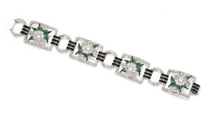 Platinum, diamond, emerald, and enamel bracelet, c1925