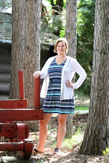 LOGGING ON. Author Caroline Akervik poses at the Paul Bunyan Logging Camp Museum in Carson Park.