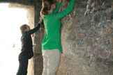 The archaeologists went to work, carefully cleaning the painting, removing soot and dirt