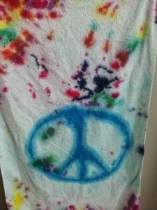 When I twisted the towel up from the center and dyed the outside, it gave me this cool pattern with lots of white space - less than thrilling for a little kid, probably. Peace sign to the rescue!