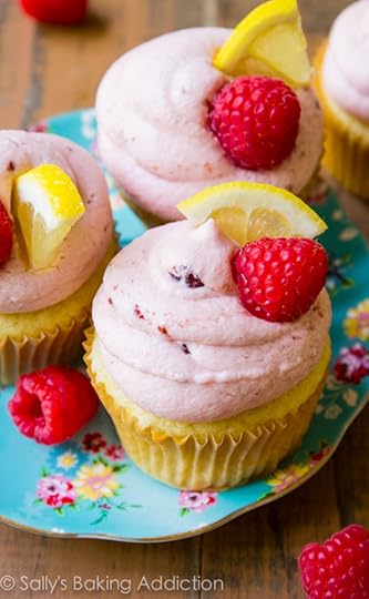 A deliciously moist and flavorful lemon cupcake topped with rich and creamy raspberry frosting! The sweetest, simplest cupcake recipe by sallysbakingaddiction.com