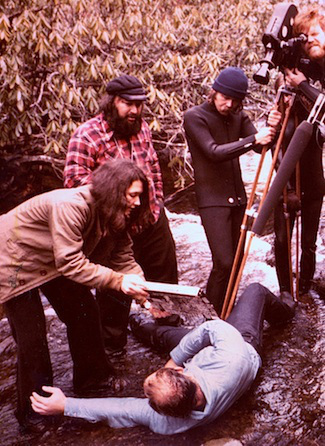 The joys of shooting in the great outdoors. That's me in the plaid shirt.
