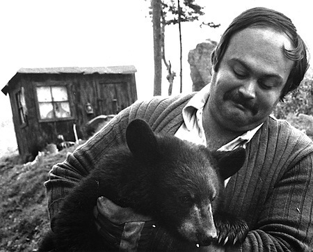 Producer George Macrenaris makes friends with our star. Behind him is the shack of the bad guys. These scenes were shot at Grandfather Mtn., NC.