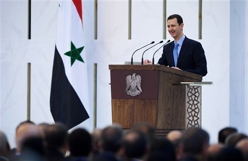 Bashar al Asad durante il discorso di insediamento, 17 luglio 2014 (AFP)