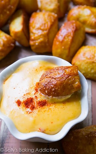 Soft Pretzel Bites with Spicy Cheese Sauce - this recipe is so simple. And the cheese sauce is to die for! sallysbakingaddiction.com