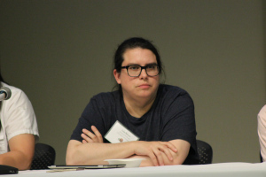 Listening to audience comments at the Transnational Feminist Summer Institute at OSU