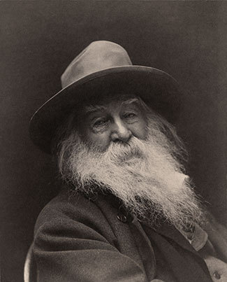 Walt Whitman by George C. Cox (1851–1903, photo) Adam Cuerden (1979-, restoration). Public domain via Wikimedia Commons.