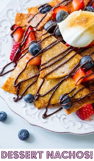 The BEST Dessert Nachos with homemade chocolate sauce, whipped cream, fresh fruit, and lots of cinnamon-sugar!