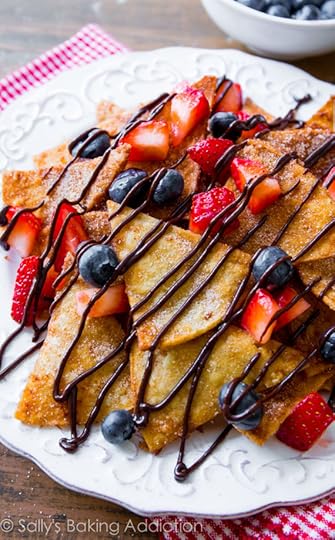 The BEST Dessert Nachos with homemade chocolate sauce, whipped cream, fresh fruit, and lots of cinnamon-sugar!