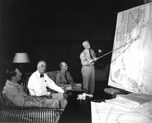Pres. Franklin Roosevelt in conference with Gen. Douglas MacArthur, Adm. Chester Nimitz, and Adm. William Leahy, Hawaii, July 1944. (US Navy)