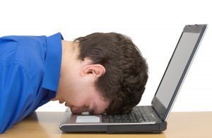 man-with-head-on-keyboard