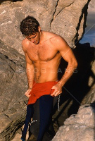Guy Taking Off His Wetsuit