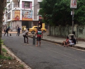 Every day the kids play cricket in the street.