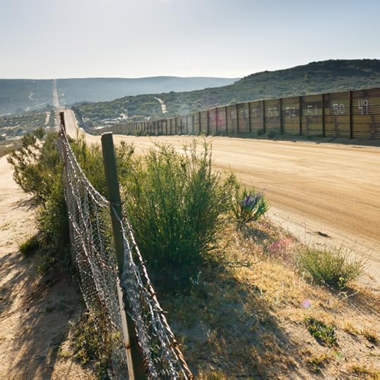 US/Mexico border fence near Campo, California, USA. © PatrickPoendl via iStockphoto.