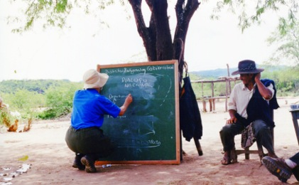 'The author instructing the Guarani community about how to hold the state accountable'