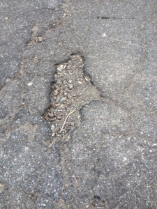 Pothole in Camden, Maine shaped like the state of Maine. Is there a message here?