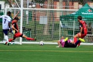 Horace James scores the opening goal after a howler from Scorpions' keeper Josh Saunders.